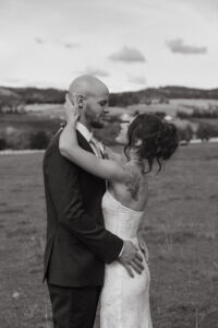 couple standing in field