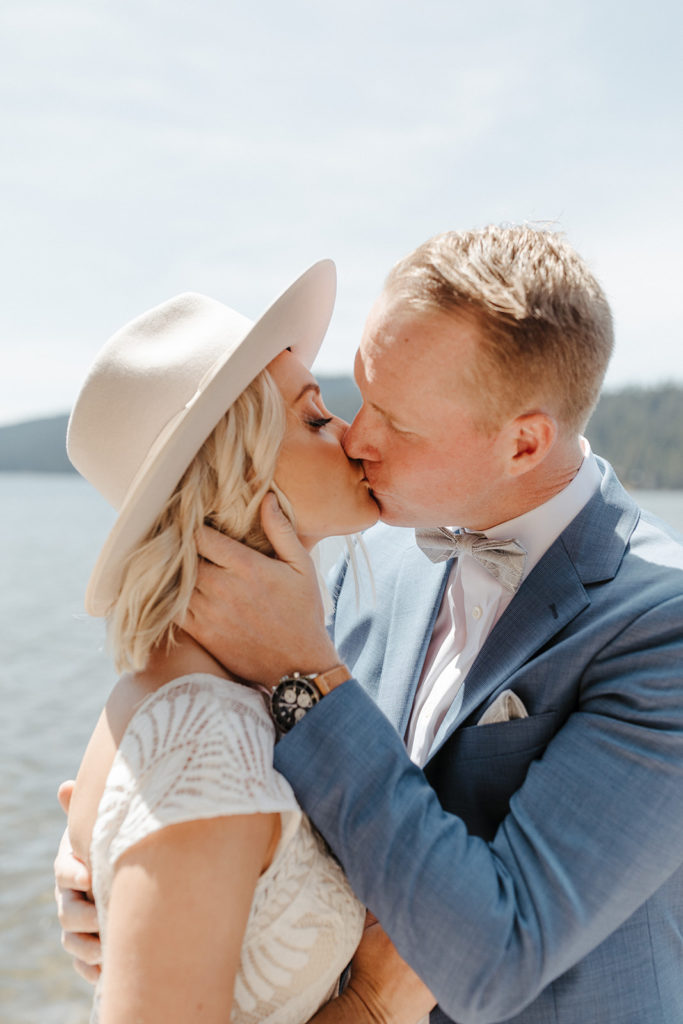 Couple share a kiss during their wedding shoot with Morgan Wirth at the Ranch of the Canyons, a wedding venue in Bend, Oregon