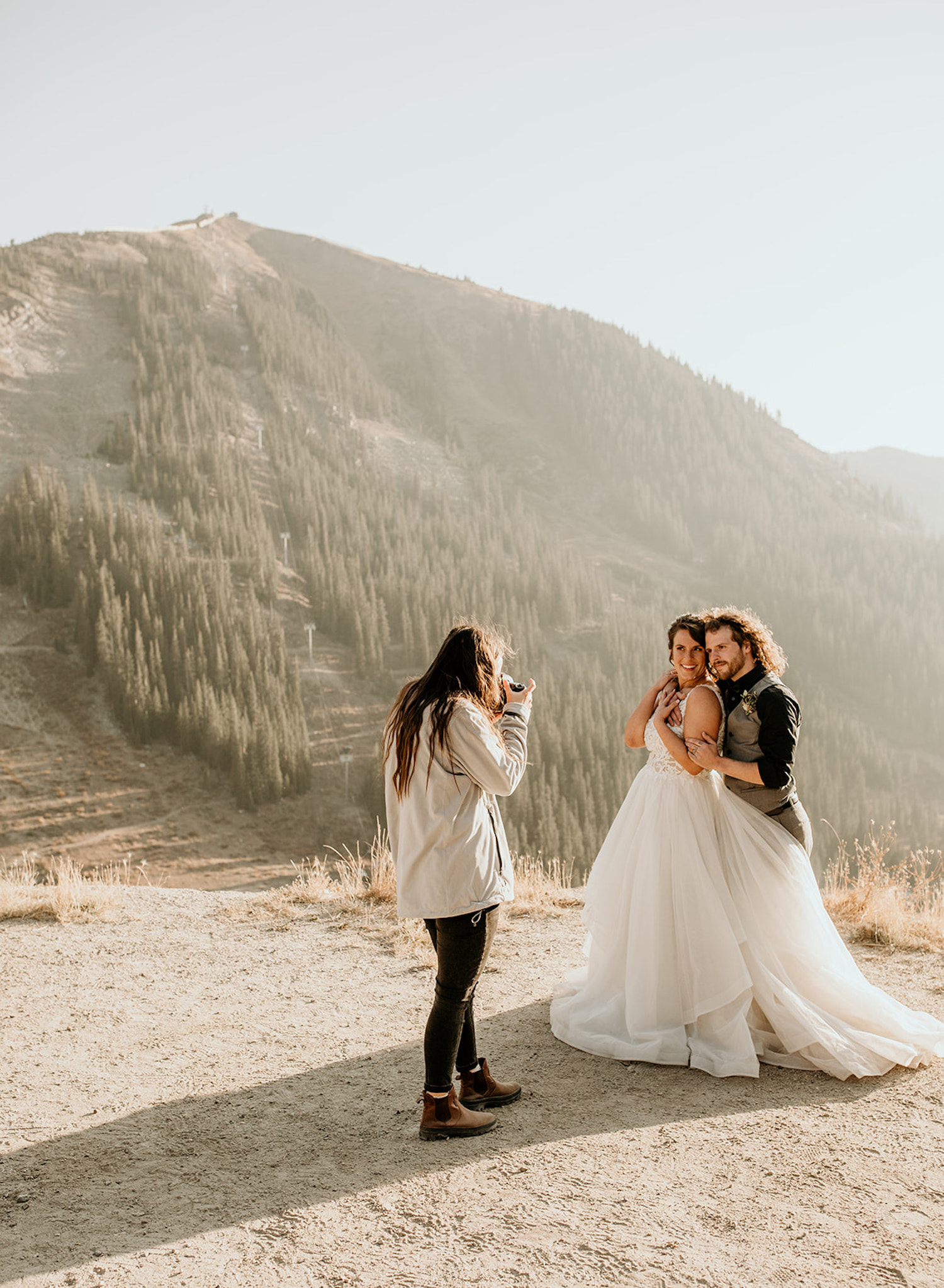 Wedding Photography Price Guide: Why Having One Is A Must! Oregon Wedding Photographer Morgan Wirth takes a photo of bride and groom for their photoshoot in the highlands