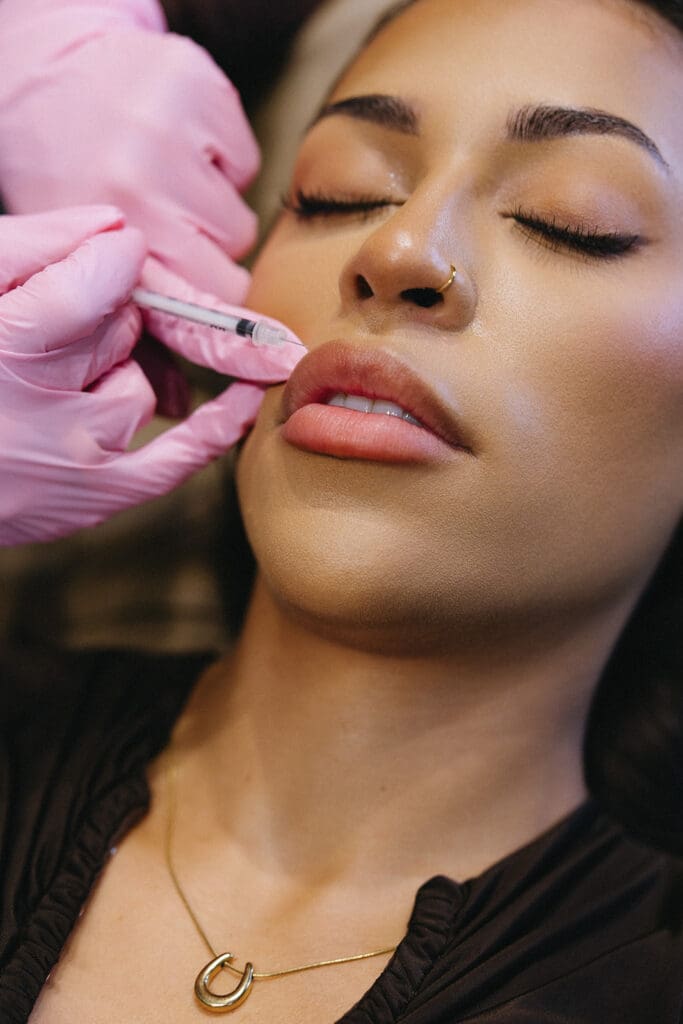 Injectables service during a branding session at a Dallas med spa.