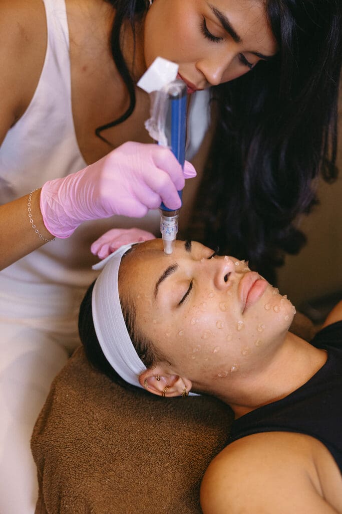 Editorial close-up of injector pen tool at a Dallas med spa.