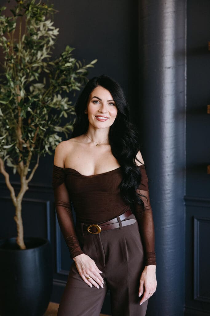 Lifestyle portrait of med spa owner in a luxury Dallas space.