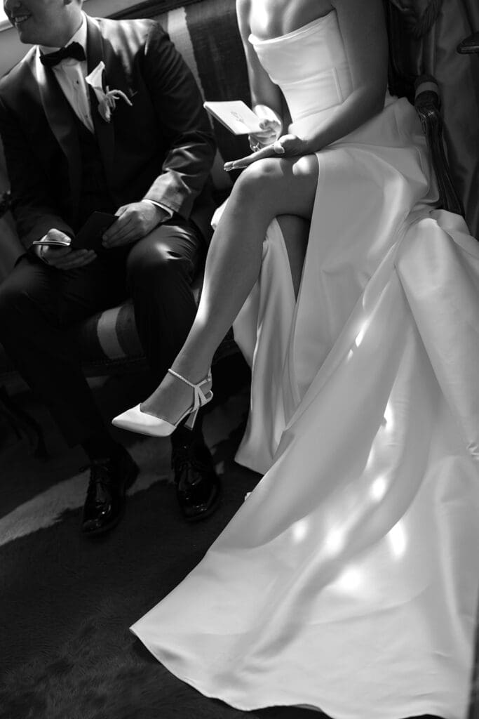 Bride stepping into the ceremony in satin gown at The Mason wedding in Dallas