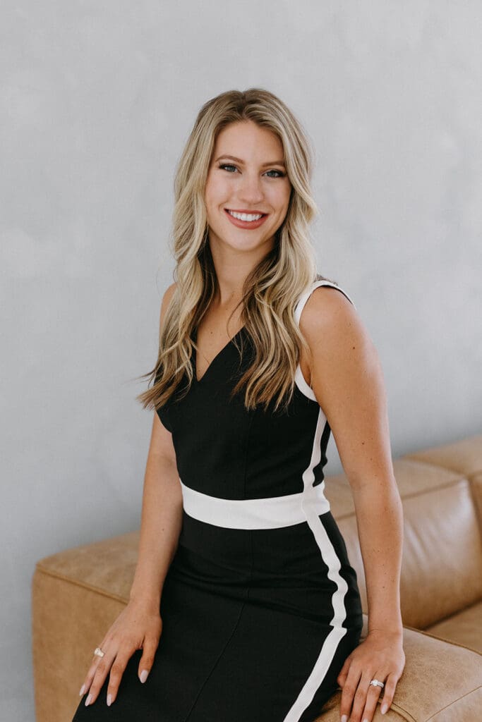 Modern Dallas brand photography with clean, minimal studio backdrop.